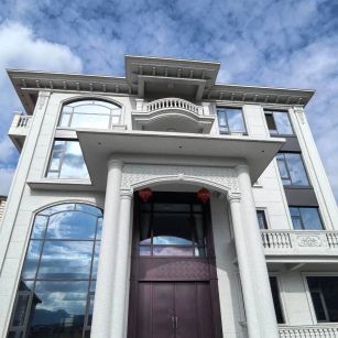 泰安白麻别墅外墙干挂石材效果示例