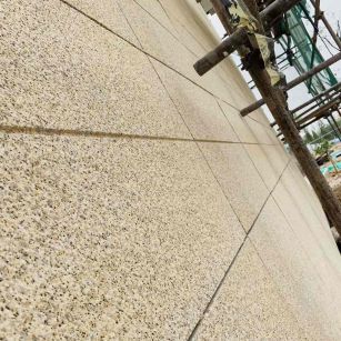 泰安 黄金麻花岗岩荔枝面外墙干挂石材效果示例