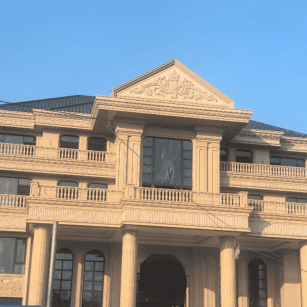 泰安黄金麻别墅外墙干挂石材效果示例