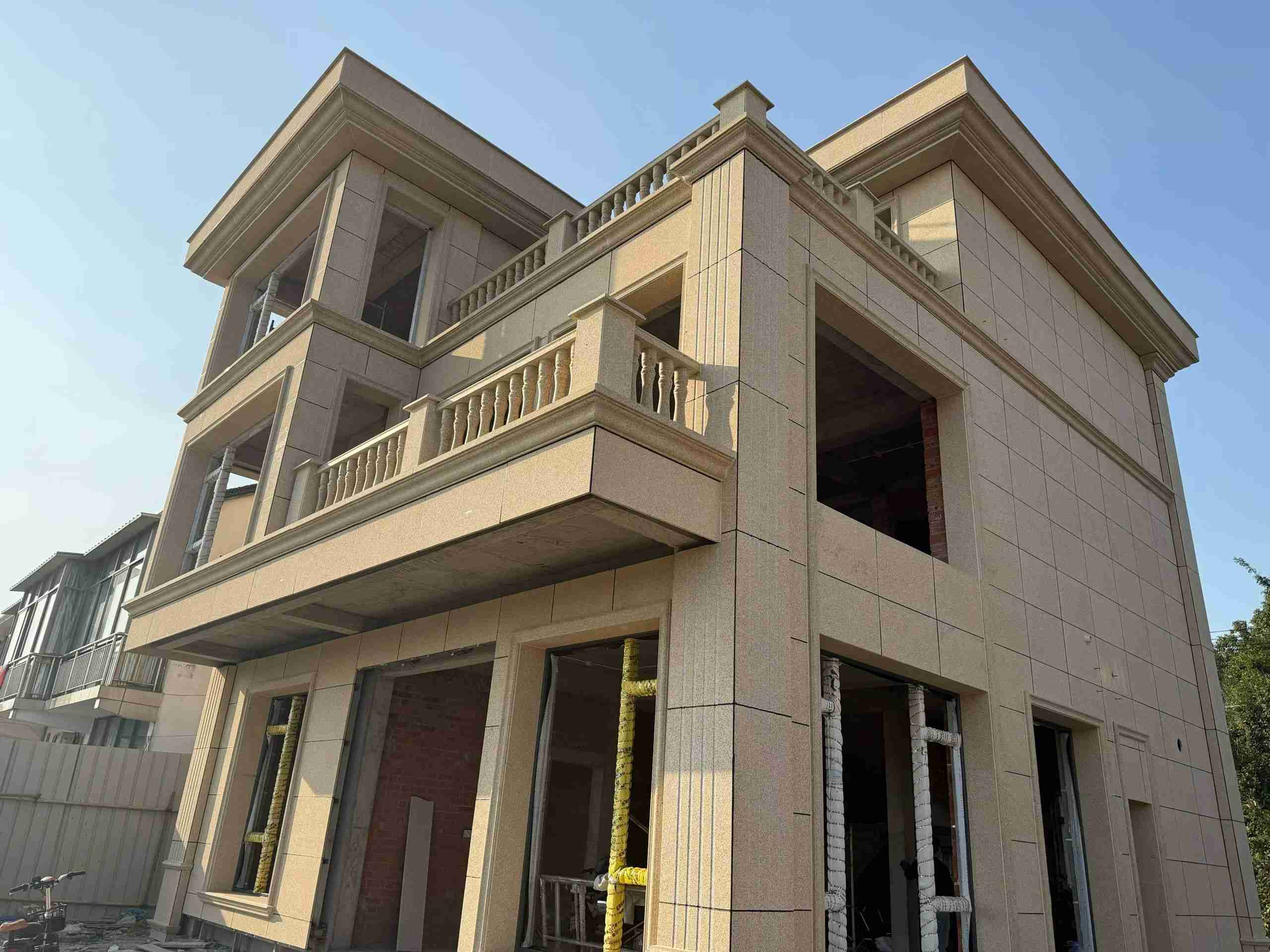 泰安 黄金麻花岗岩石材荔枝面外墙干挂效果展示